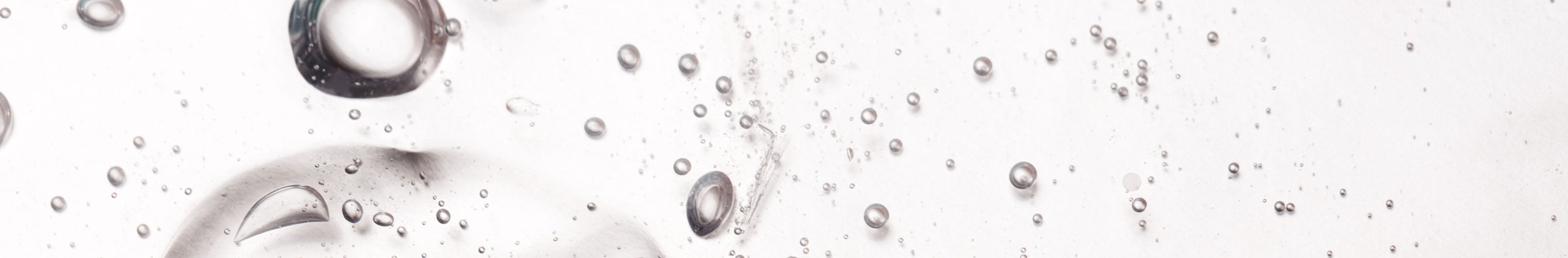 close up of clear liquid with bubbles